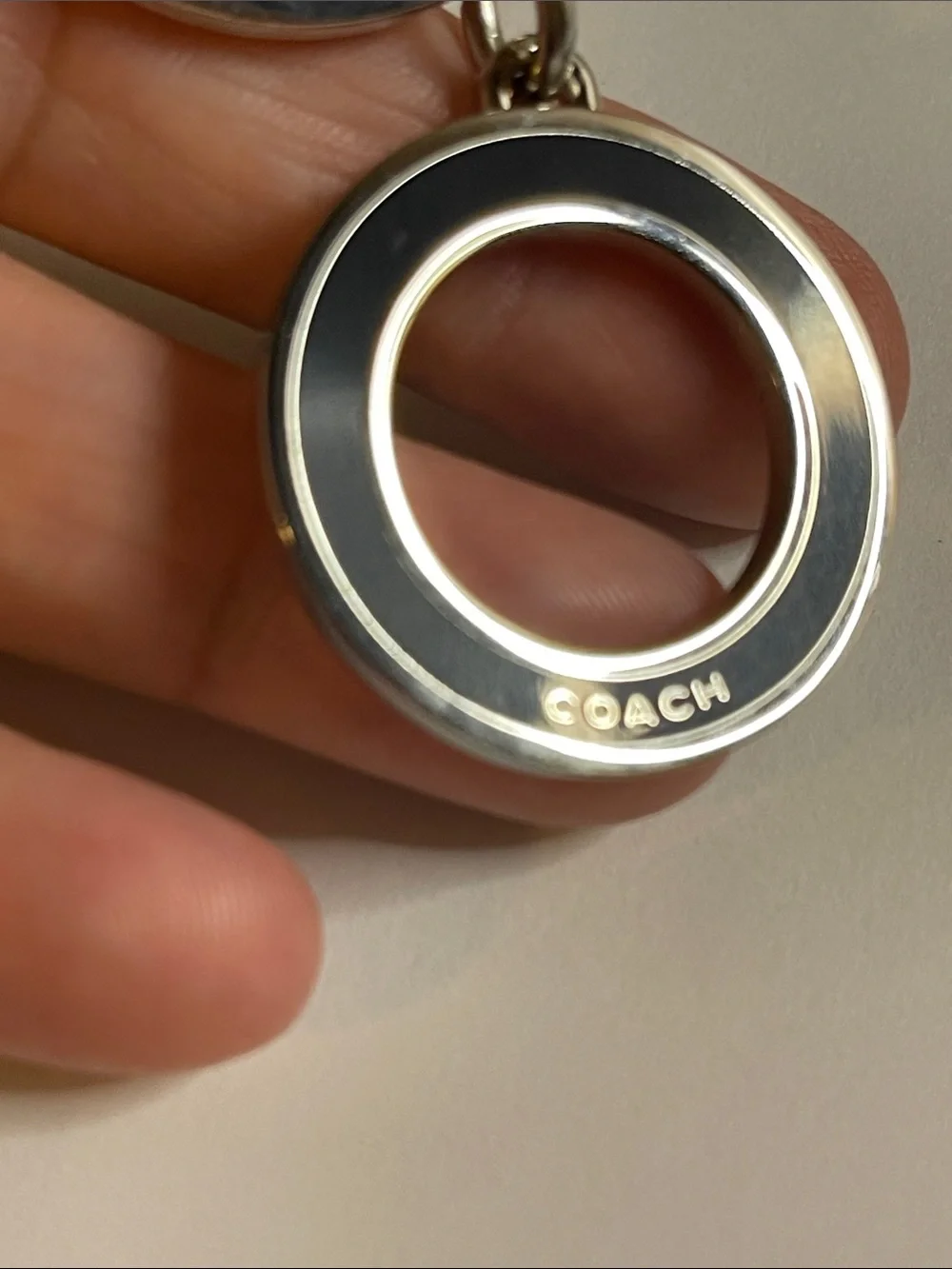 Coach Black & Silver Circular Keyring and Coach Pen